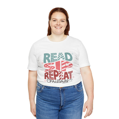 Read Sip Repeat Christmas Tee, Holiday T-Shirt, Cozy Christmas Gift, Unisex Short Sleeve Shirt, Reader's Holiday Apparel, Winter Graphic Tee